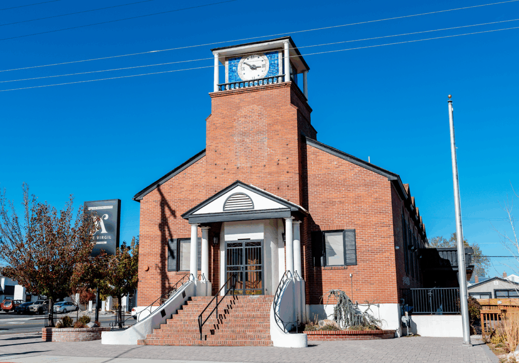 Exterior of The Virgil, an old brick church building that has been converted into an event space.