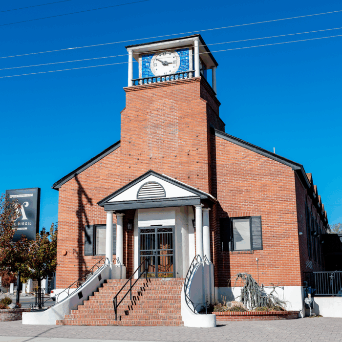 Exterior of The Virgil, an old brick church building that has been converted into an event space.
