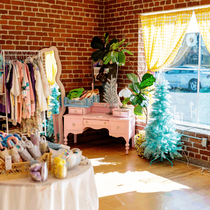 The inside of a story with a variety of pink and feminine products.